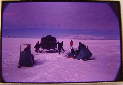  1963 SNOWMOBILES PULLING CRASHED HUEY AT SOUTH POLE OPERATION DEEP FREEZE.JPG